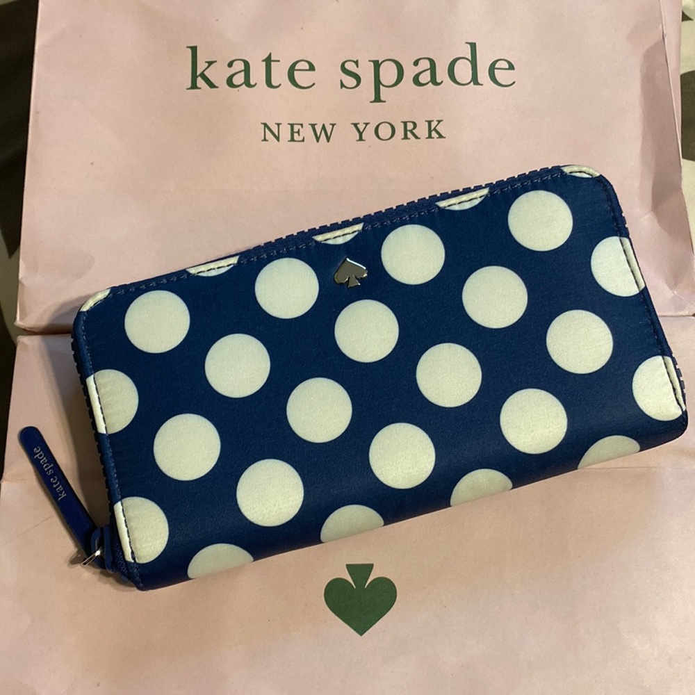 Brand new navy kate spade wallet with polka dots